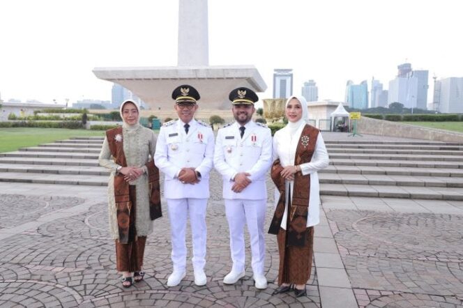 
					Pasangan Nurochman - Heli Suyanto resmi dilantik menjadi Wali Kota dan Wakil Walikota Batu  (Foto: Diskominfo Kota Batu)