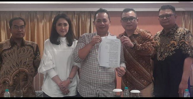 Muhammad Marzuki  bersama dengan pengacaranya  Ruben Siregar. (foto : Ist)