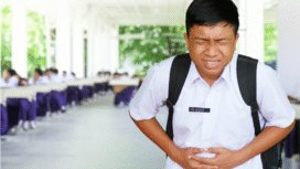 Ilustrasi anak sekolah sedang merasakan sakit perut diduga setelah santap menu MBG (lmarena ai)