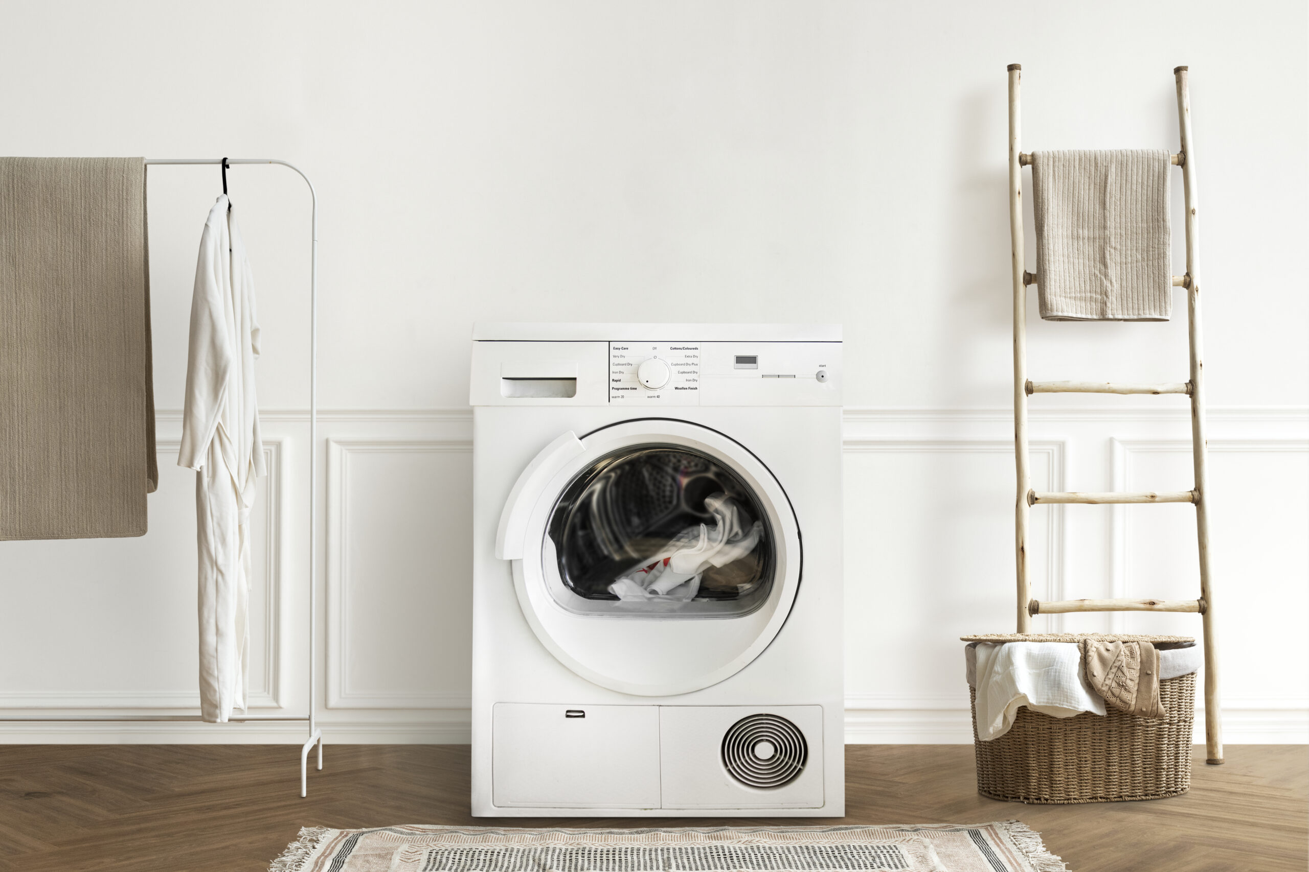 Washing machine in a minimal laundry room interior design