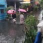 Kondisi di beberapa wilayah perum dasana indah, air hujan bercampur dengan lumpur hitam pekat. (Foto: Dok. jejaknarasi.id)