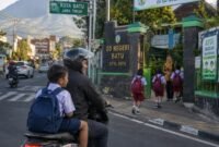 Seorang ayah sedang mengantarkan anaknya ke sekolah. (Foto: Ilustrasi)