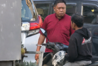 Pemilik Alphard terduga pelaku pengerusakan motor driver ojol. (Foto: 1st)